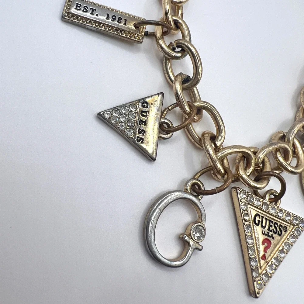 GUESS Vintage Gold Tone Charm Bracelet Rhinestone Logo Est 1981 Y2K Signed